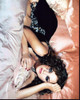 Marion Cotillard Laying On Bed In Animal Print Dress Photo Print - Item # MVM55539