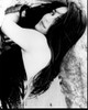 Madeleine Stowe Laying Black And White Photo Print - Item # MVM55999