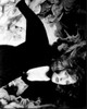 Gillian Anderson Leaning On Painting Black And White Photo Print - Item # MVM55477