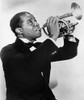 Louis Armstrong playing the trumpet Photo Print - Item # VARCEL680796