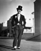Fred Astaire Walking in Formal Suit Photo Print - Item # VARCEL680962