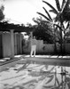 Fred Astaire standing by the Poolside in Black and White Photo Print - Item # VARCEL681003