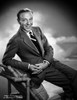 Fred Astaire Suited on Arm Chair in Black and White Photo Print - Item # VARCEL681113