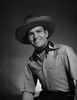 Gene Autry wearing Cowboy Outfit, Posed in Striped Shirt Photo Print - Item # VARCEL681144