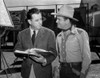 Gene Autry Talking to a Man Holding a Book Photo Print - Item # VARCEL681162