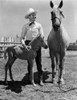 Gene Autry smiling with a Horse and Pony Photo Print - Item # VARCEL681167