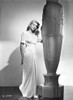 Lauren Bacall wearing a dress by a sculpture Photo Print - Item # VARCEL681232