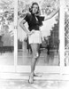 Lauren Bacall wearing shorts by a door Photo Print - Item # VARCEL681246