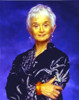 Barbara Barrie wearing Black Dress in Blue Background Photo Print - Item # VARCEL681370