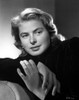 Ingrid Bergman sitting and Leaning on a Couch in a Black Long Sleeve Polo Photo Print - Item # VARCEL681989