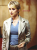 Josie Bissett Posed in Glossy Coat and Blue Shirt Portrait Photo Print - Item # VARCEL682148