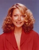 Susan Blakely smiling in Red Sweater Photo Print - Item # VARCEL682198