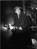 Film still featuring Humphrey Bogart cracking a safe Photo Print - Item # VARCEL682257