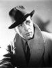 Humphrey Bogart wearing a fedora Photo Print - Item # VARCEL682267