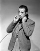 Humphrey Bogart on telephone smoking Photo Print - Item # VARCEL682302