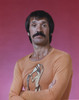 Sonny Bono Posed in Orange Long Sleeve Shirt Photo Print - Item # VARCEL682366