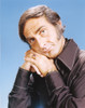 Sid Caesar wearing a Black Coat in Blue Background Photo Print - Item # VARCEL683207