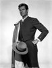 Hugh O'Brian holding a hat Photo Print - Item # VARCEL683332