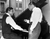 Johnny Mathis by a piano Photo Print - Item # VARCEL683581