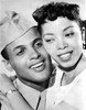 Harry Belafonte in military uniform with a woman Photo Print - Item # VARCEL683585