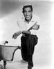 Sammy Davis Jr kneeling Photo Print - Item # VARCEL683605