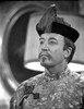 A film still of Peter Sellers wearing a Chinese costume Photo Print - Item # VARCEL683725