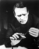 Film still featuring Patrick McGoohan with a tape recorder Photo Print