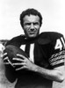 Film still of James Caan playing football Photo Print - Item # VARCEL684010