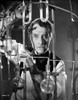Peter Cushing with chemistry equipment Photo Print - Item # VARCEL684163