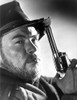 Jack Lambert holding a gun Photo Print - Item # VARCEL684169