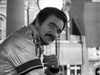 Burt Reynolds wearing a metallic jacket Photo Print - Item # VARCEL684180