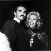 Burt Reynolds and a woman Photo Print - Item # VARCEL684183