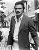 Burt Reynolds wearing a suit outdoors Photo Print - Item # VARCEL684185