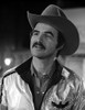 Film still of Burt Reynold wearing a cowboy hat Photo Print - Item # VARCEL684189