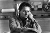 Film still of Michael Douglas talking on the telephone Photo Print - Item # VARCEL684264