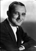 a member of the Dorsey Brothers smiling Photo Print - Item # VARCEL684290