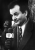 Film still of Bill Murray with a microphone Photo Print - Item # VARCEL684692