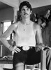 Eric Roberts wearing a tank top with a moustache Photo Print - Item # VARCEL684713