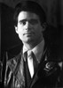 Treat Williams wearing a leather jacket and a police badge Photo Print - Item # VARCEL684729