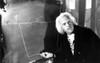 Film still of Christopher Lloyd with a chalkboard Photo Print - Item # VARCEL684833