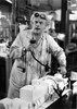 Film still of Christopher Lloyd wearing a lab coat Photo Print - Item # VARCEL684834