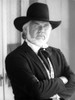 Kenny Rogers with his arms crossed wearing a cowboy hat Photo Print - Item # VARCEL684864