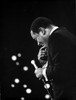 Flip Wilson on stage with a microphone Photo Print - Item # VARCEL684899