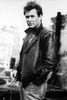 Film still of Tom Berenger wearing a leather jacket outdoors Photo Print - Item # VARCEL684921