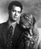 Tom Hanks wearing a patterned tie and a dog Photo Print - Item # VARCEL684960