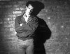 Tom Hanks with arms crossed in front of a brick wall Photo Print - Item # VARCEL684962