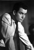 Film still of Charlie Sheen wearing a striped shirt and tie Photo Print - Item # VARCEL684982