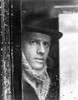 Film still featuring Christopher Lambert behind a window Photo Print