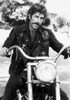 Sam Elliott on a motorcycle Photo Print - Item # VARCEL685206