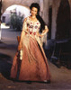 Andie MacDowell standing wearing a Floral Long Dress With Shotgun Photo Print - Item # VARCEL685315